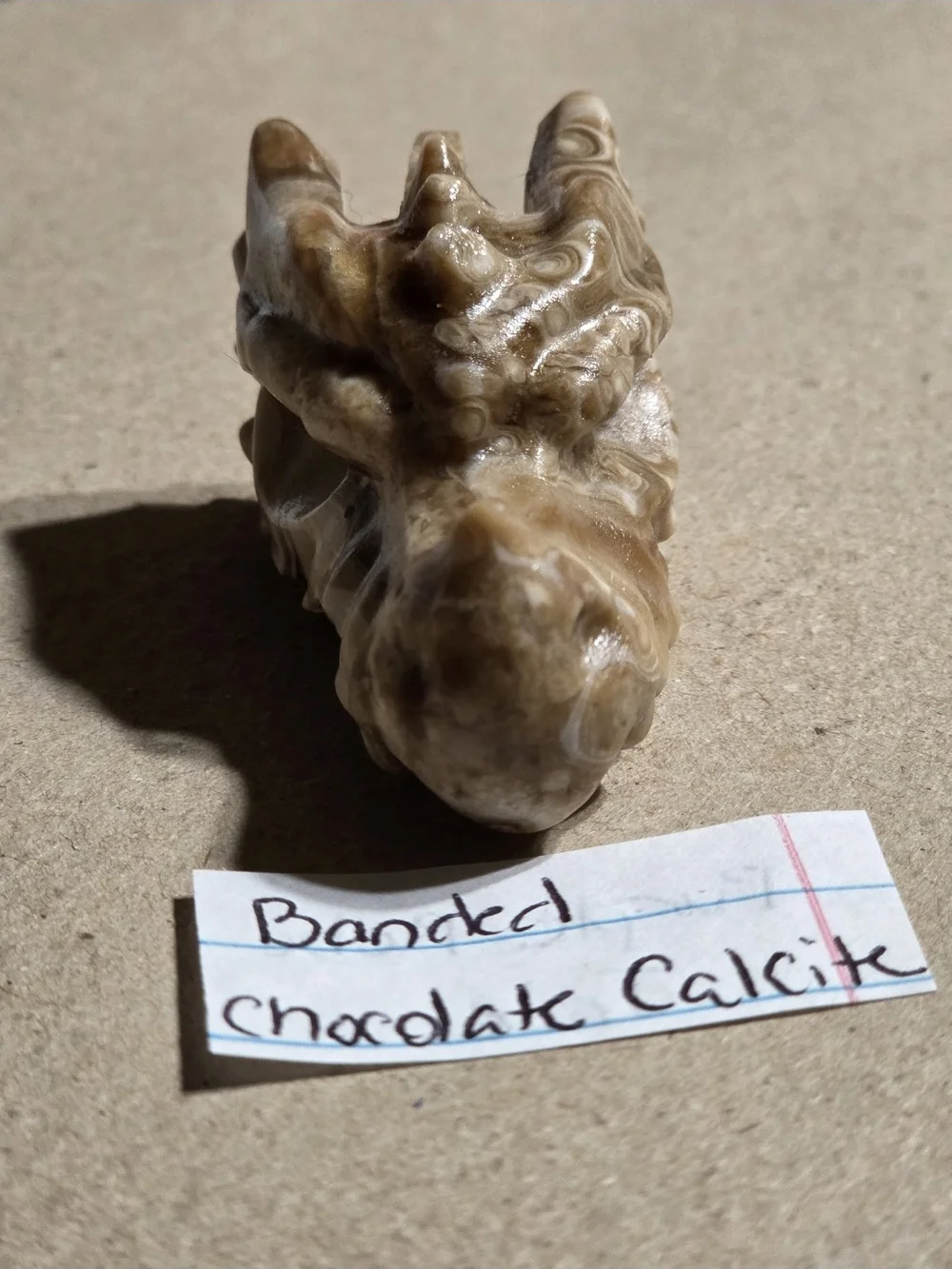 Detailed Chocolate Banded Calcite Crystal Carved Dragon Head Stone Sculpture
